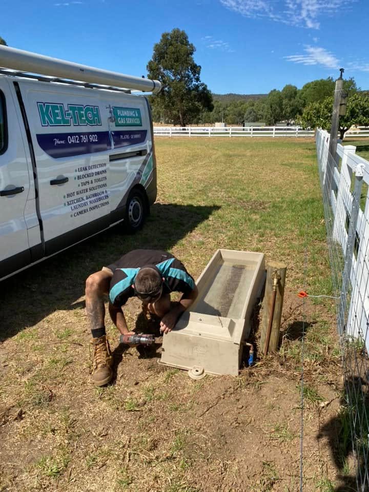 Kel-Tech plumber working on site at a rural property